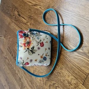 Small floral leather purse with long strap
